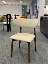 Modernist Walnut Creamy Chair